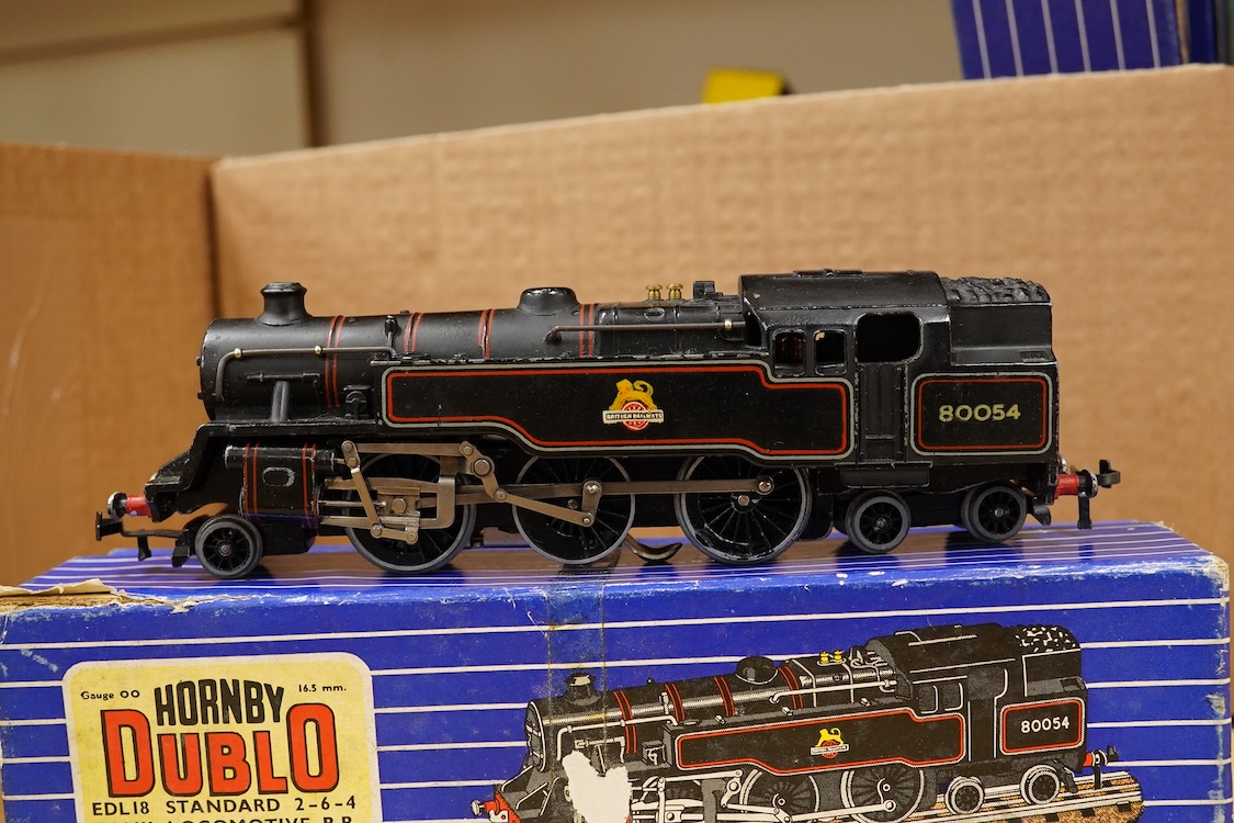 A collection of Hornby Dublo railway for 3-rail running, including two locomotives; an LMS Duchess of Athol 4-6-2, locomotive box, tender unboxed, and a boxed BR Standard Class 4 2-6-4T, 80054, together with five boxed b